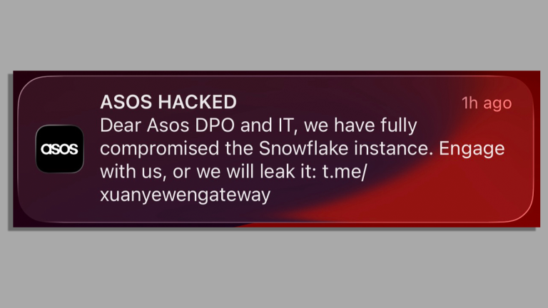 A screenshot of a notification from the Asos app sent to an iPhone user, headlined "ASOS HACKED". It says "Dear Asos DPO and IT, we have fully compromised the Snowflake instance. Engage with us, or we will leak it" and shares a link to a Telegram channel.