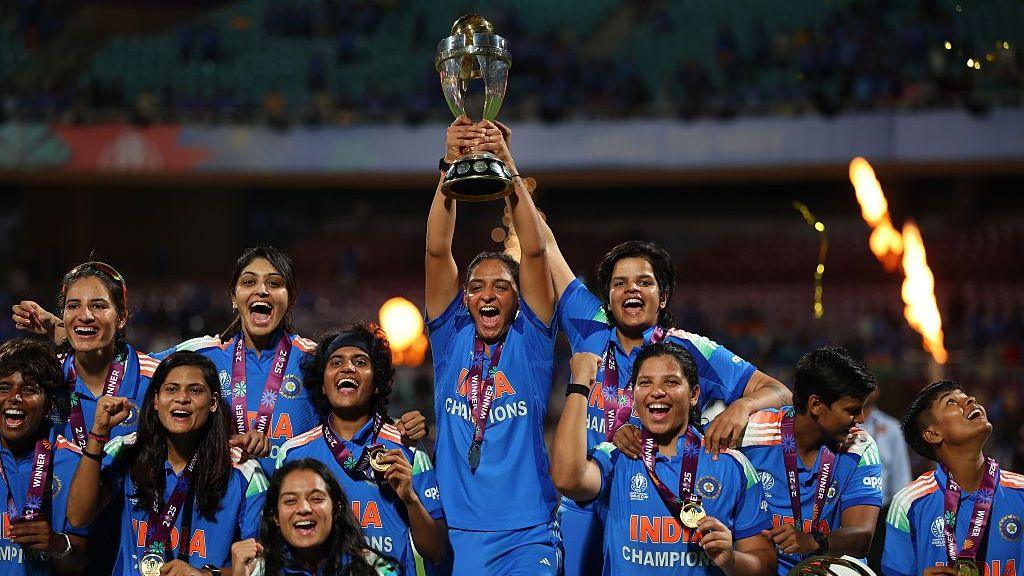 Harmanpreet Kaur of India lifts the ICC Women's Cricket World Cup trophy after her team's victory in the ICC Women's Cricket World Cup India 2025